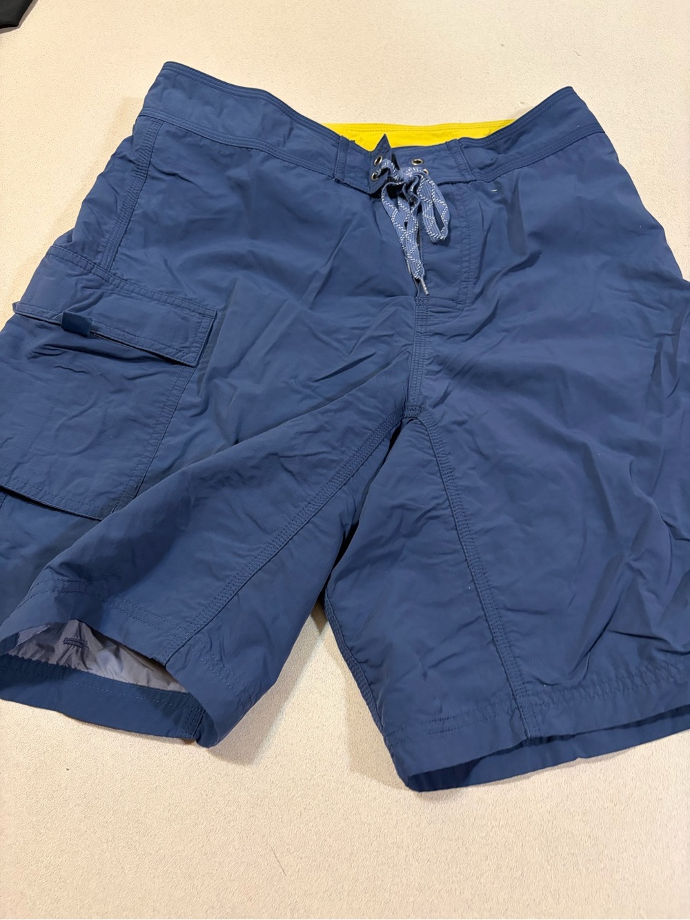 Patagonia Navy Blue Cargo Swim Shorts with Yellow Waistband